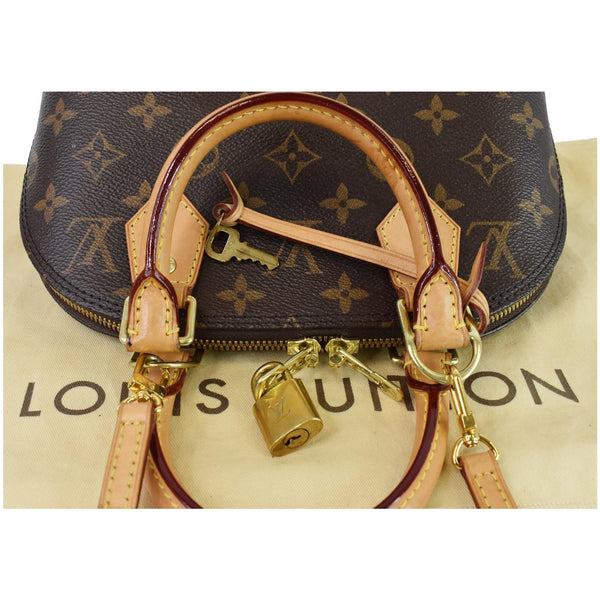 Louis Vuitton Alma BB Monogram Canvas Shoulder Bag - top above preview]