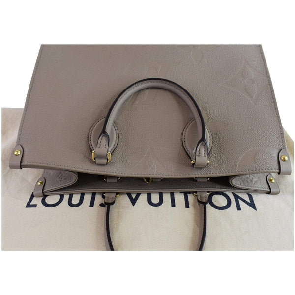 LV Onthego MM Monogram Empreinte Top Round Handles