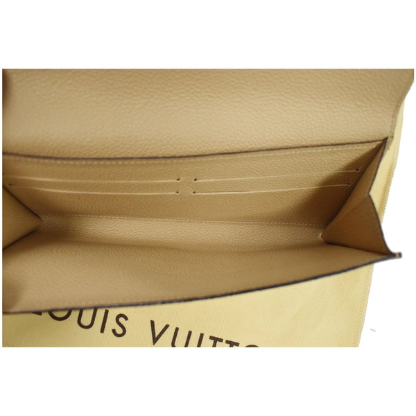 LOUIS VUITTON Curieuse Monogram Empreinte Leather Wallet Bronze