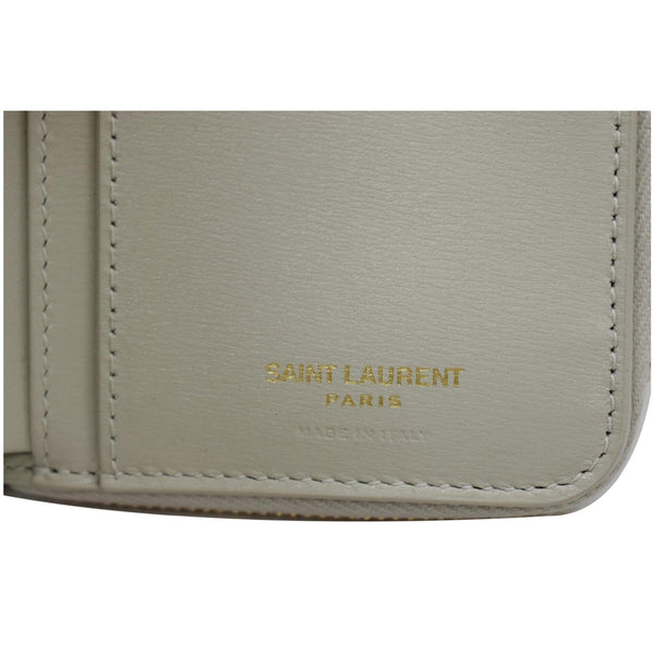 SAINT LAURENT Tiny Monogram Compact Leather Zip Around Wallet White