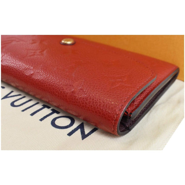 LOUIS VUITTON Emilie Monogram Empreinte Leather Wallet Red