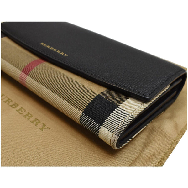Burberry Porter Continental Leather Wallet - side pose view | DDH