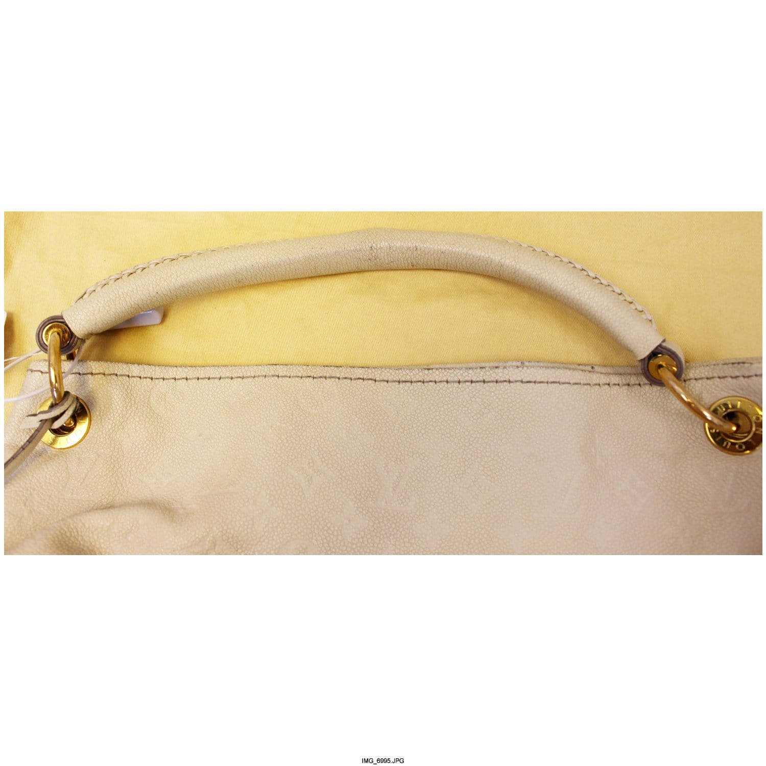 Louis Vuitton Neige Monogram Empreinte Leather Bag