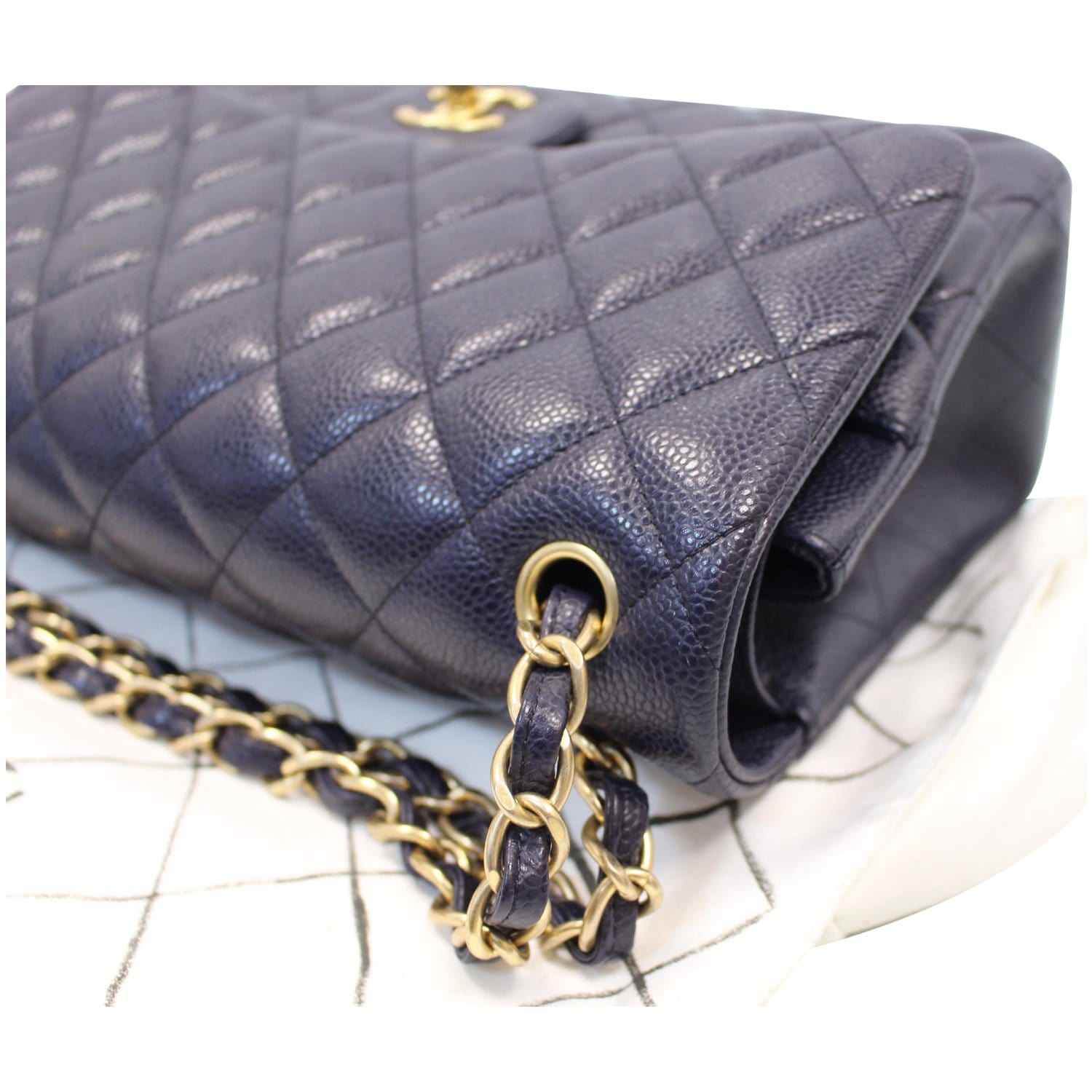 Medium flap (aka 1112 flap) in navy blue caviar leather and gold