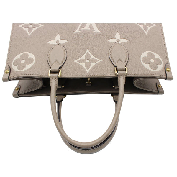 Louis Vuitton  Onthego MM Bicolor Monogram Empreinte Bag
