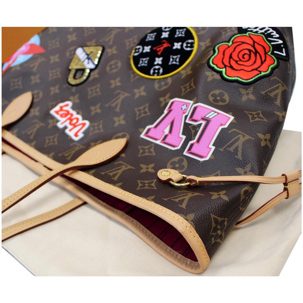 closed view Louis Vuitton Stories Neverfull MM tote