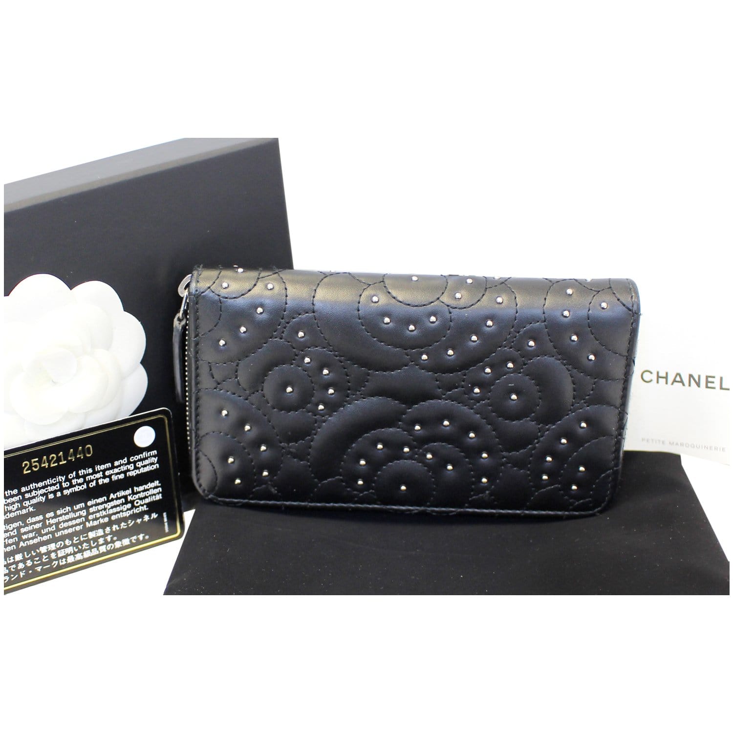 Chanel Grey Embossed Camellia Zip Wallet