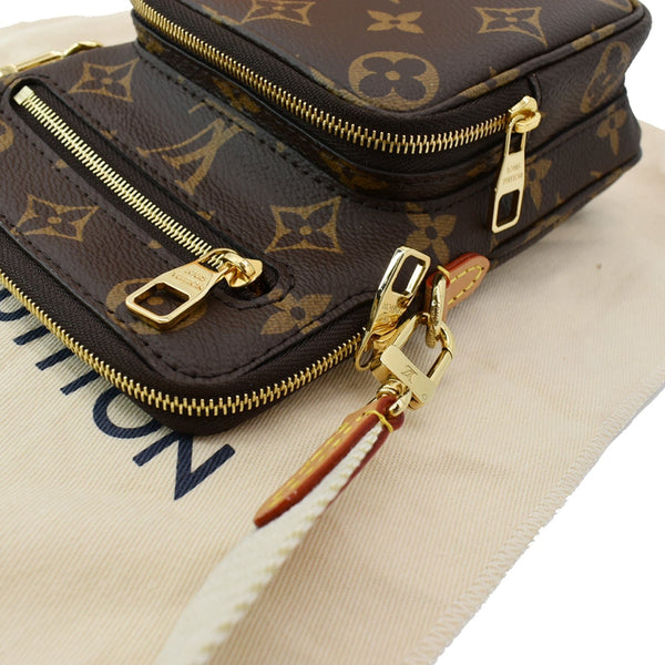 LOUIS VUITTON Utility Phone Sleeve Monogram Canvas Crossbody Bag Brown