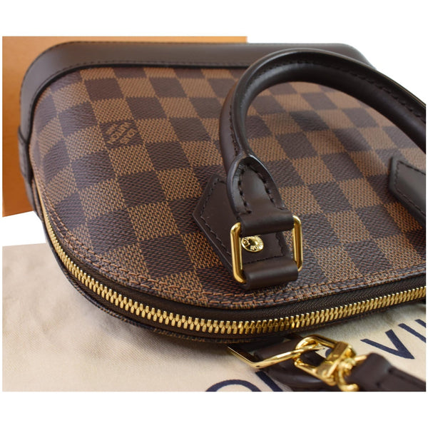 Louis Vuitton Alma BB Damier Ebene Shoulder Bag zip corner close