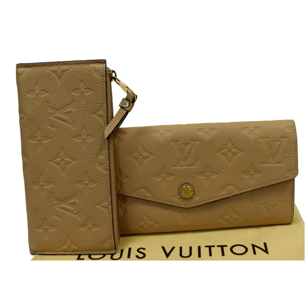 LOUIS VUITTON Curieuse Monogram Empreinte Leather Wallet Bronze