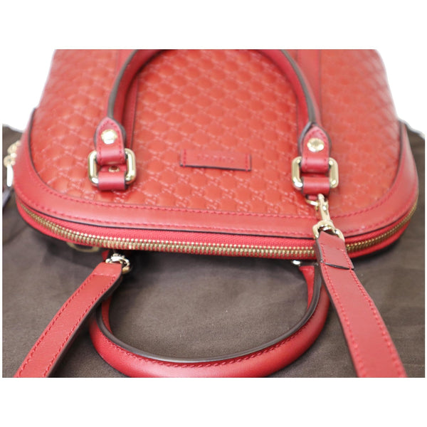 Gucci Dome Convertible Micro Guccissima Hand Bag red color