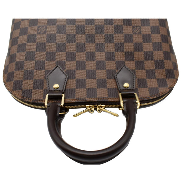 Louis Vuitton Alma PM Damier Ebene Handbag handles