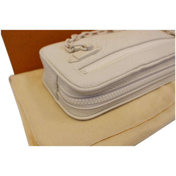 Louis Vuitton Pochette Volga Clutch Bag side view