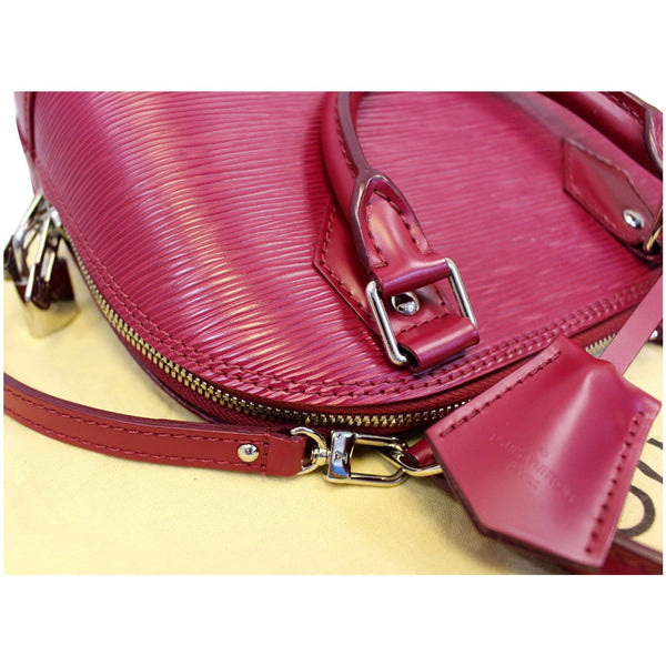 Louis Vuitton Alma BB Epi Leather hand Bag- strap logo