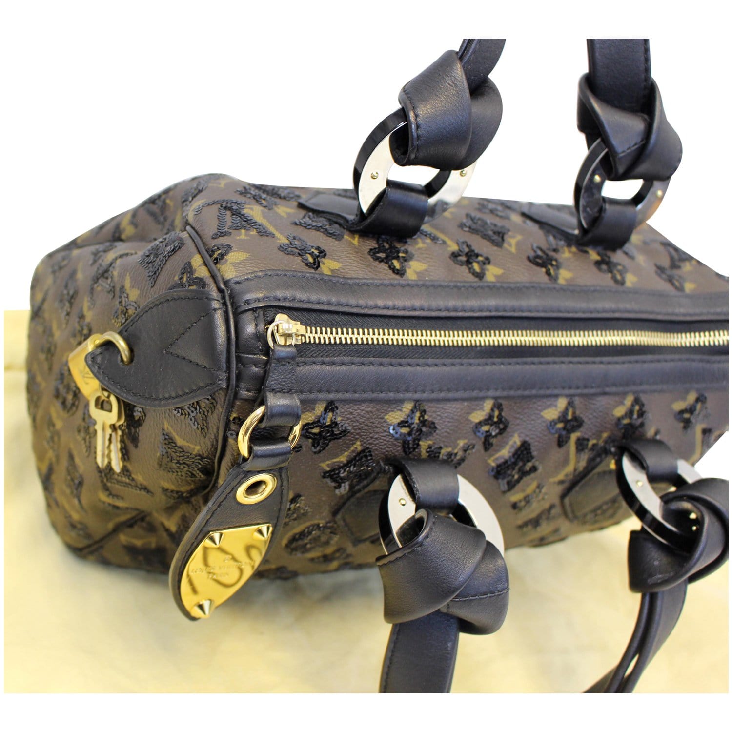 LOUIS VUITTON, a leather and woolmix monogrammed sequin embellished handbag,  Sunshine express speedy 30. - Bukowskis