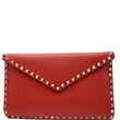 VALENTINO Garavani Rockstud Grainy Envelope Pouch Red