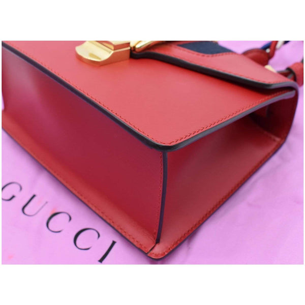 Gucci Sylvie Mini Leather Crossbody Bag - bottom corner