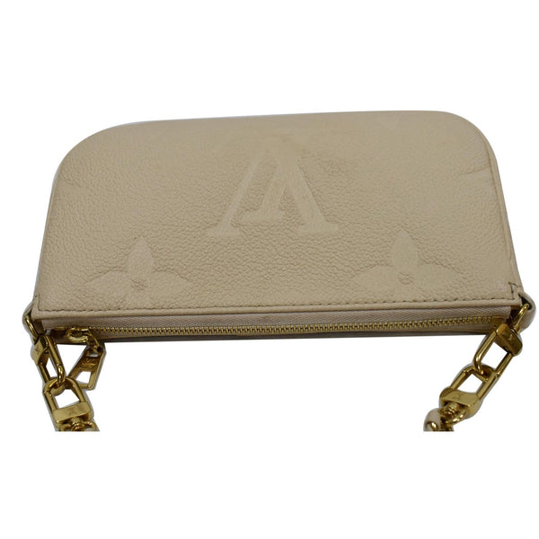LOUIS VUITTON Multi Pochette Accessories Empreinte Bag Cream