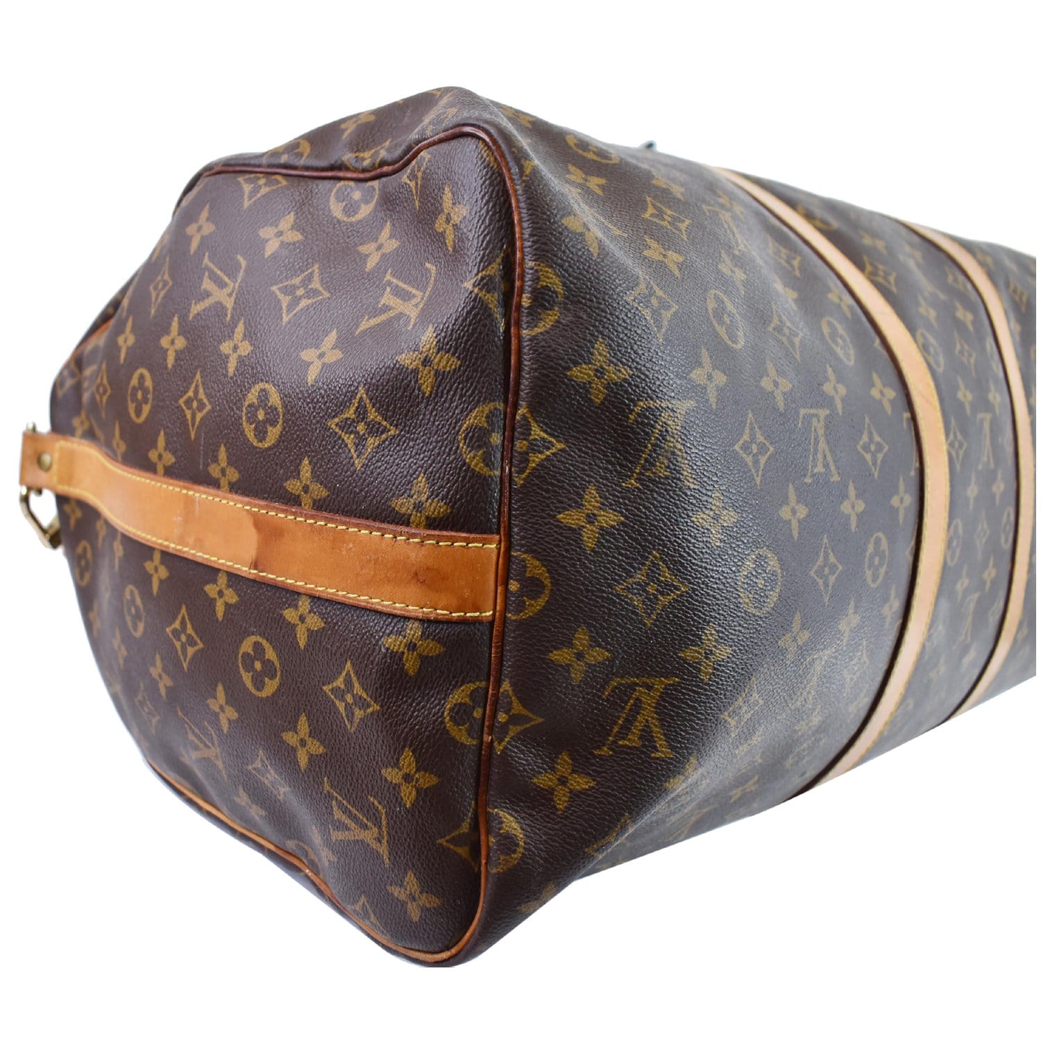 The smallest sized Keepall in Monogram canvas is the ideal travel  companion. Its supple an…