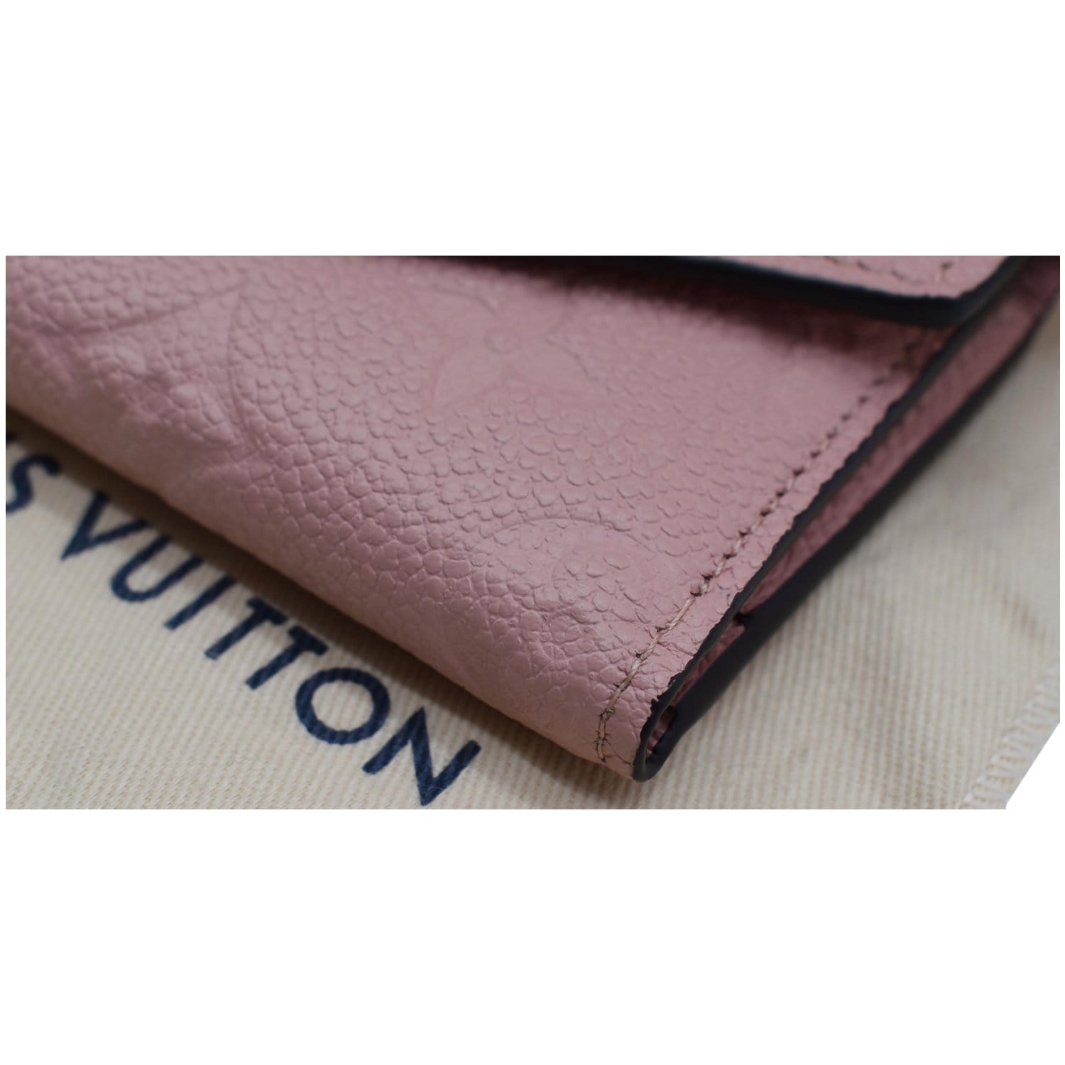Buy Louis Vuitton Zoe Wallet Rose Poudre Monogram Empreinte M62936 at