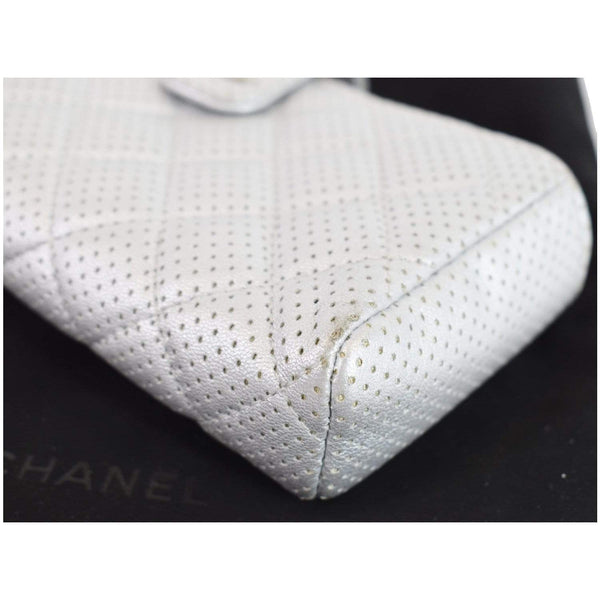 Chanel Perforated Lambskin Quilted Mini Phone Holder doted corner