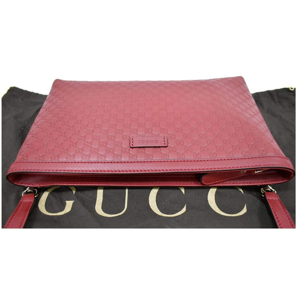 Gucci Flat Microguccissima Leather Crossbody Pouch red