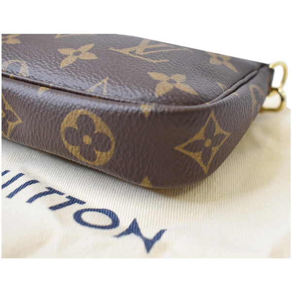 Louis Vuitton Mini Pochette Monogram Canvas Pouch Brown - flower on corner