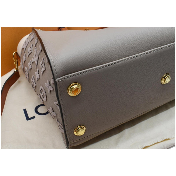 Louis Vuitton On My Side MM Monogram Tufting bag - metal feet