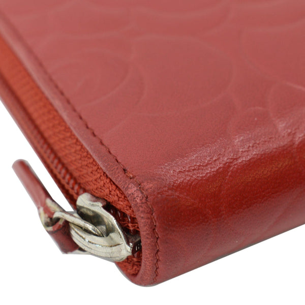 CHANEL Zippy Camellia Embossed Leather Wallet Red