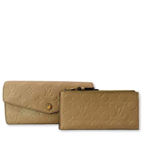 LOUIS VUITTON Curieuse Monogram Empreinte Leather Wallet Bronze