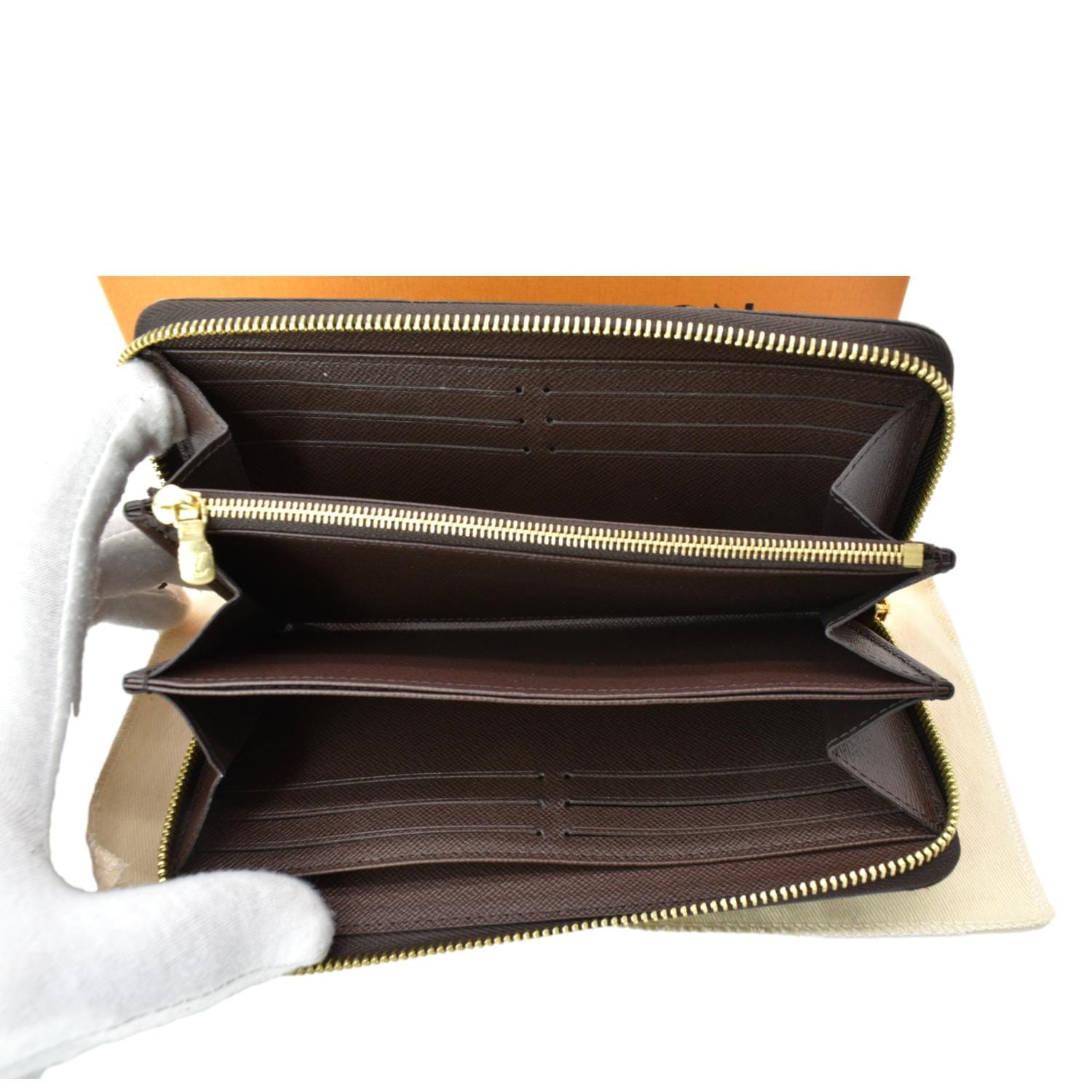 Louis Vuitton brown/tan Damier zip wallet. Beautiful interior with