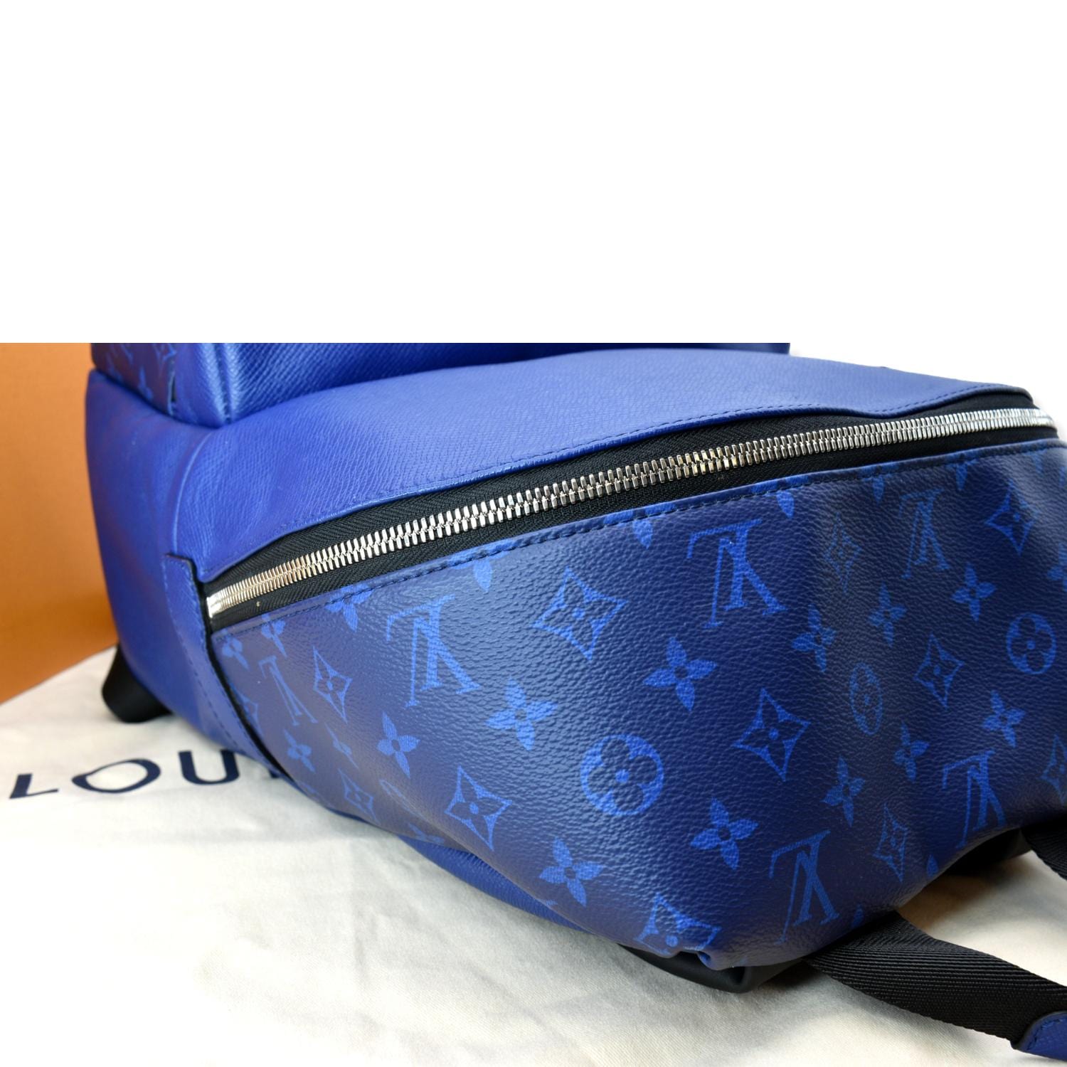 LOUIS VUITTON Discovery Taiga Monogram Leather Backpack Blue