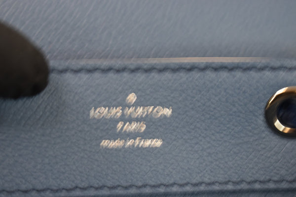 LOUIS VUITTON Lockme Calfskin Leather Backpack Blue/Beige