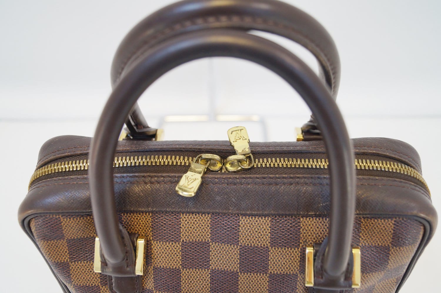 At Auction: Louis Vuitton, Louis Vuitton Damier Ebene Brera Top Handle Bag