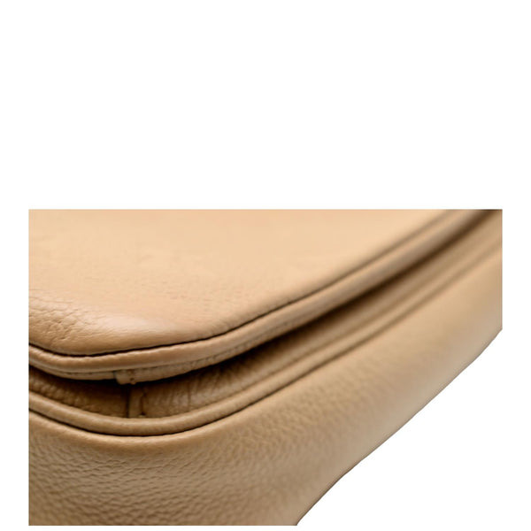 LOUIS VUITTON Metis Pochette Empreinte Leather Crossbody Bag Beige