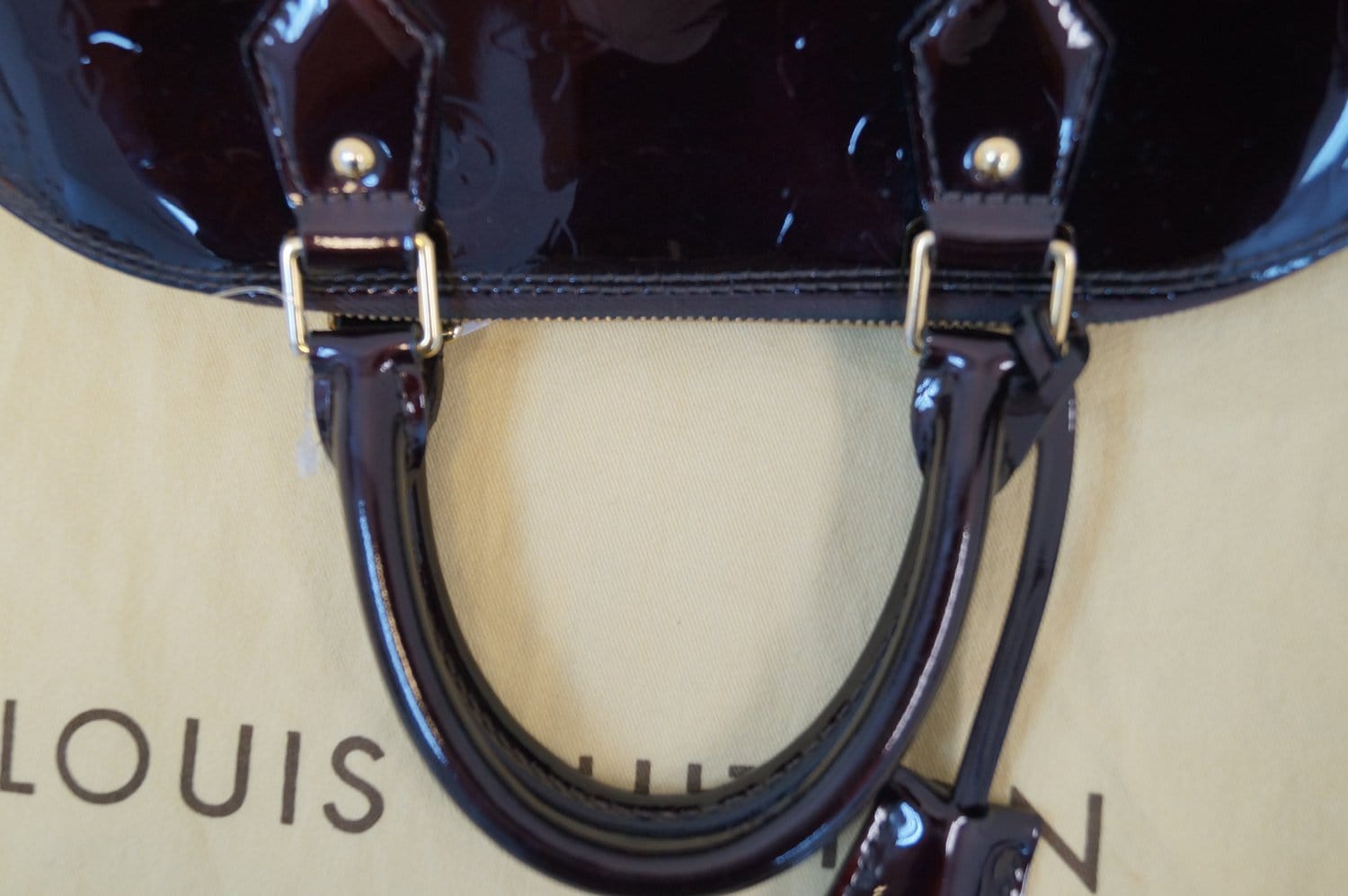 Authentic Louis Vuitton Amarante Monogram Vernis Leather Alma PM