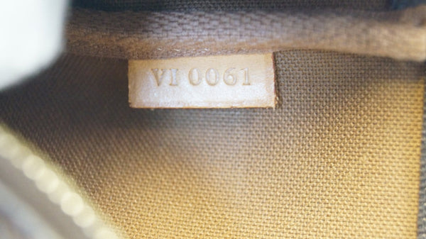 LOUIS VUITTON Brown Monogram Canvas Pochette Accessoires Pouch