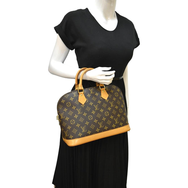 LOUIS VUITTON Alma PM Monogram Canvas Satchel Bag Brown