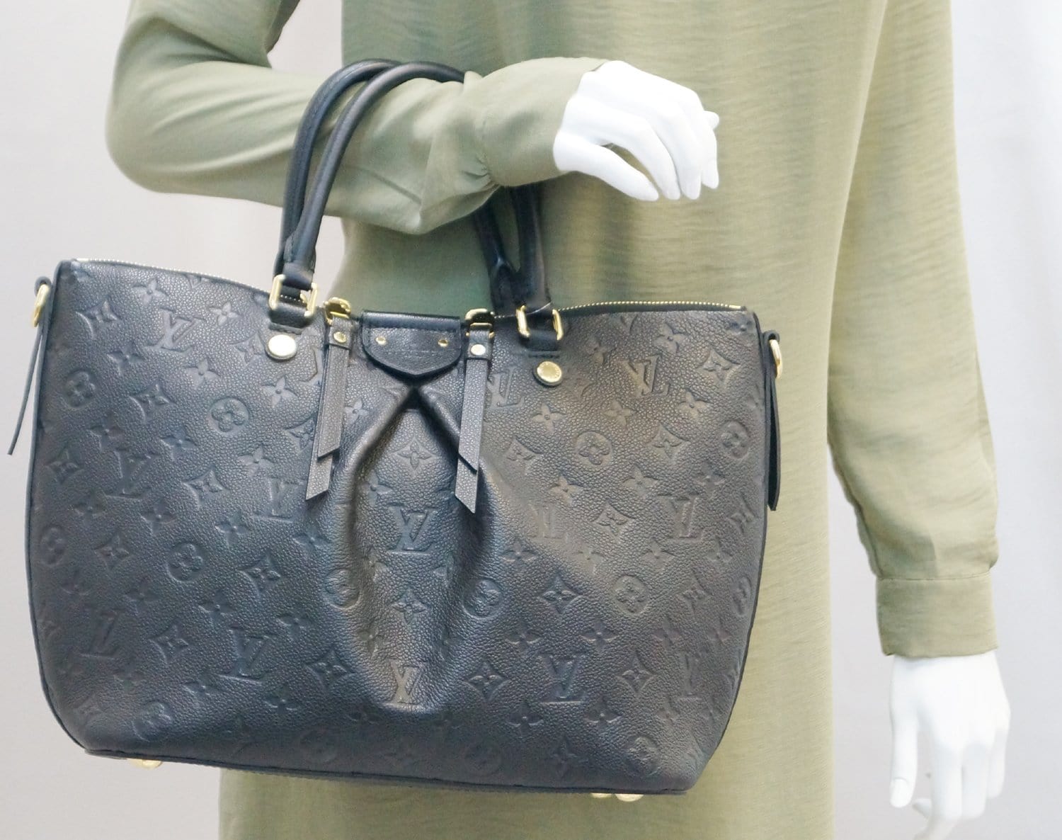 LOUIS VUITTON Mazarine Empreinte PM Handbag in Black - More Than