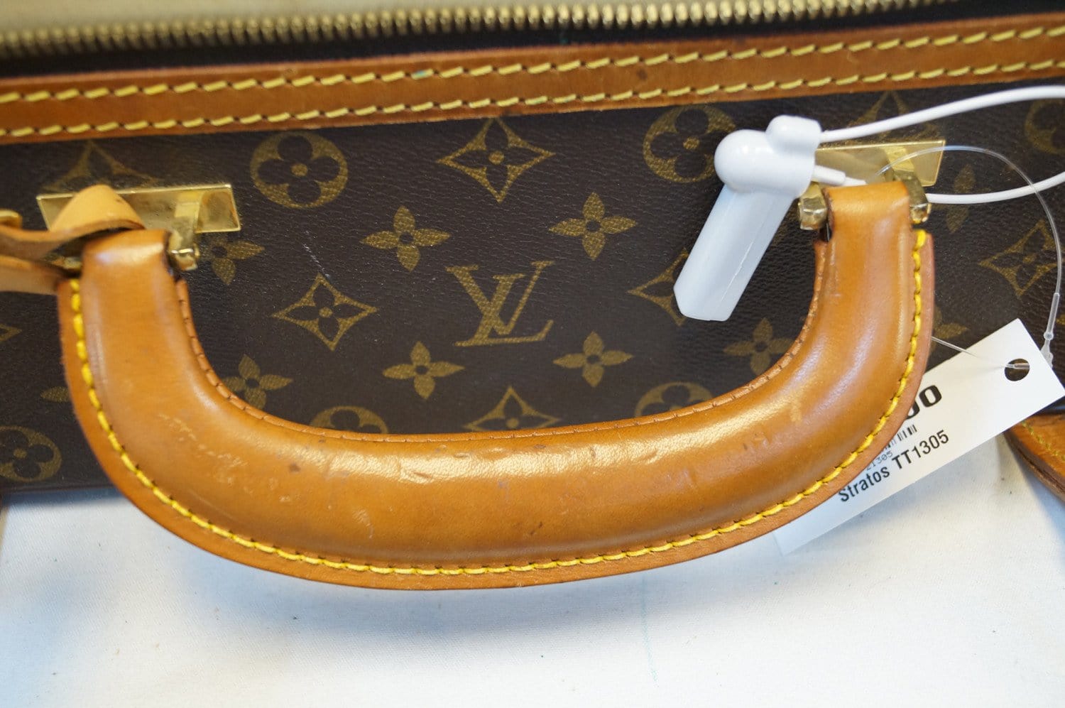 LOUIS VUITTON.STRATOS vintage suitcase with padlock, cov…