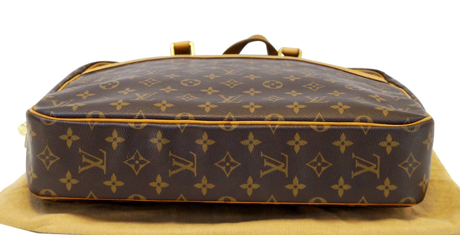 LOUIS VUITTON Coated Canvas and Vachetta Leather Porte Documents Pegase For  Sale at 1stDibs