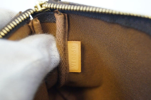 LOUIS VUITTON Monogram Canvas Pochette Accessoires Handbag