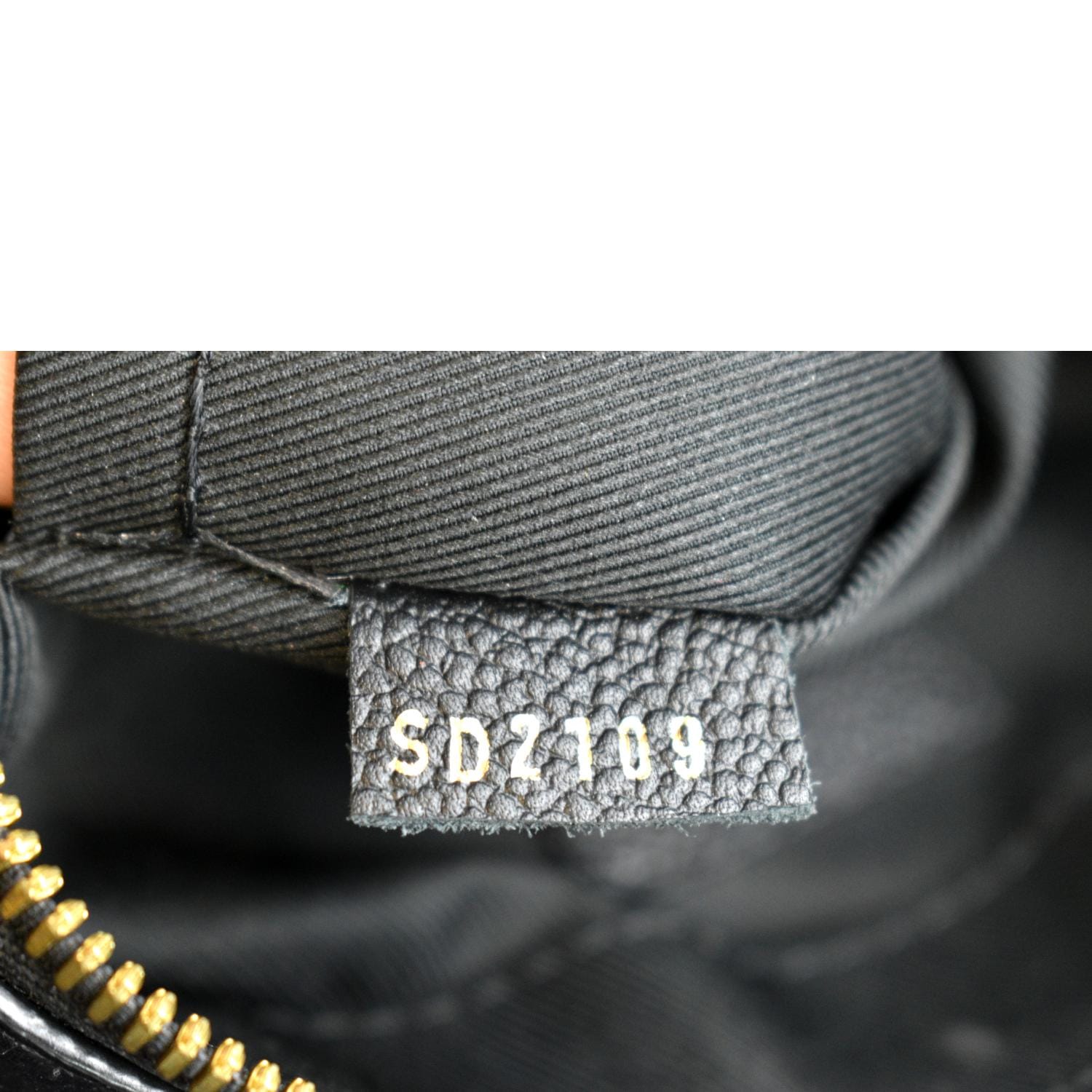 LV Saintonge Monogram Empreinte Leather Creme Caramel – newlookbag