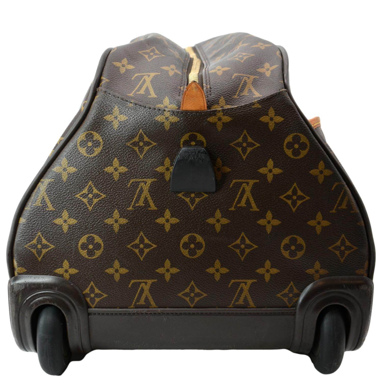 A Damier Eole 50 suitcase, Louis Vuitton. Features Damier leather