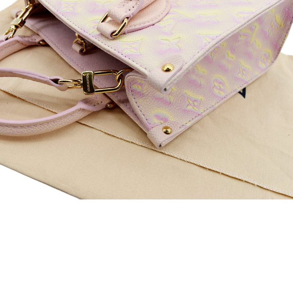 LOUIS VUITTON Stardust Onthego PM Monogram Empreinte Shoulder Bag Light Pink