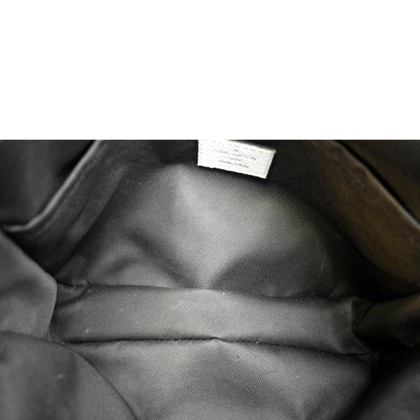 LOUIS VUITTON Outdoor Messenger Monogram Taiga Leather Shoulder Bag featuring a classic interior