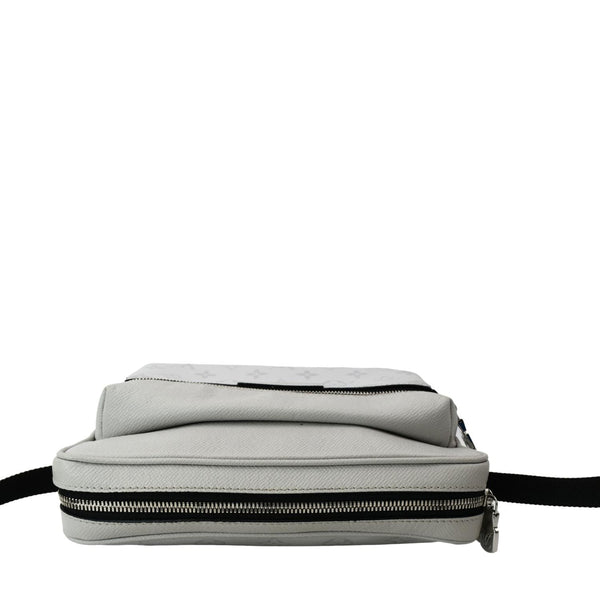 LOUIS VUITTON Outdoor Messenger Monogram Taiga Leather Shoulder Bag featuring a zip on top
