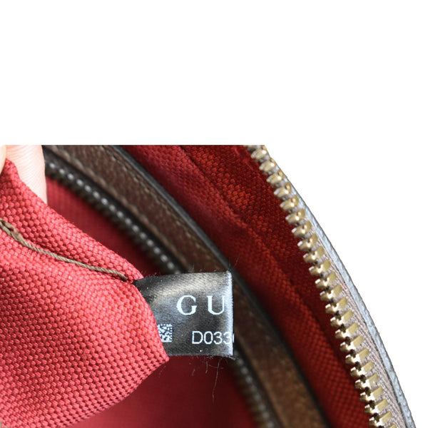 Gucci xDisney GG Supreme Canvas Belt Bag in Beige Color - Front side Tag