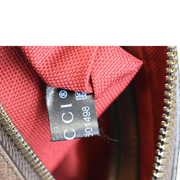 Gucci xDisney GG Supreme Canvas Belt Bag in Beige Color - Backside Tag