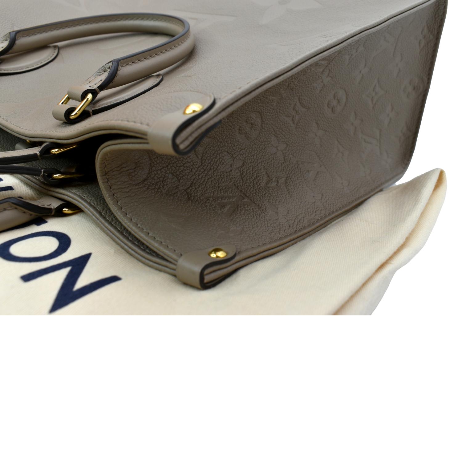 Louis Vuitton Neverfull MM Tourterelle Monogram Empreinte Leather.  Microchip, Women's Fashion, Bags & Wallets, Shoulder Bags on Carousell